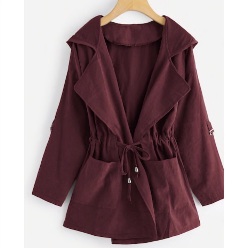 Never worn. Plum colored lightweight jacket.